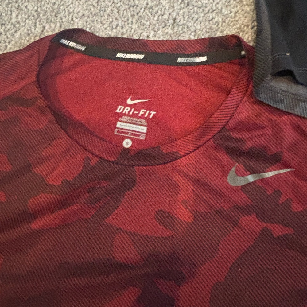 Lot of 3 Nike Running Dri Fit . Used maybe once . In perfect shape!